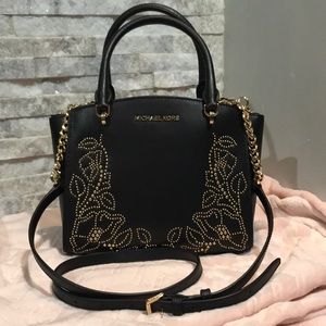 Black Michael Kors handbag with gold studs